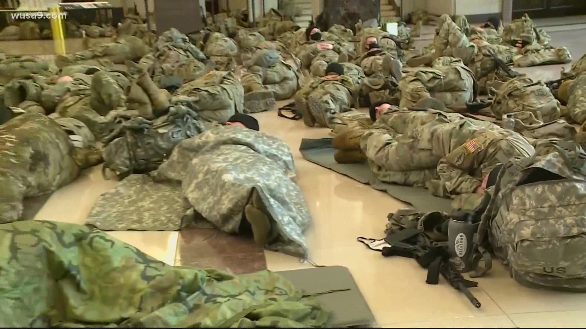 Why did National Guard troops in D.C. sleep in a parking garage.... √