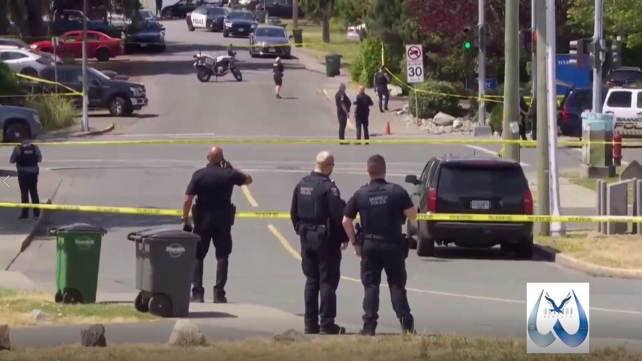 Two Gunmen Killed, Six Officers Wounded in Shootout at Canadian Bank ...